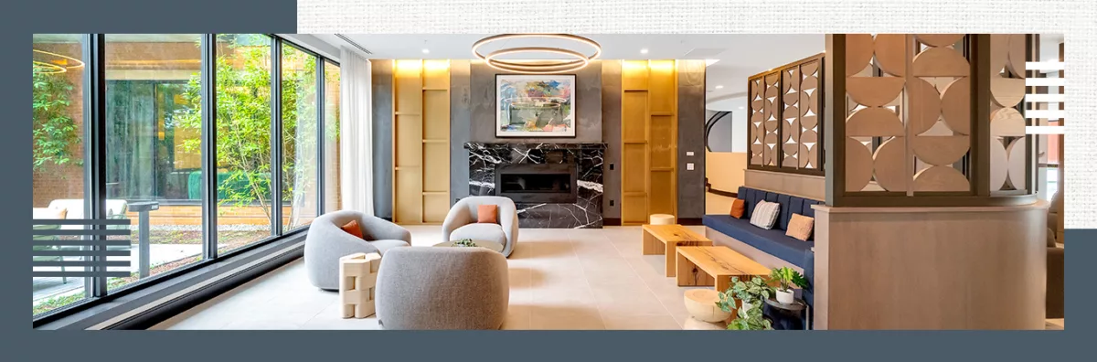 A photo of a lounge with a fireplace and seating, on a background of blue and textured beige.