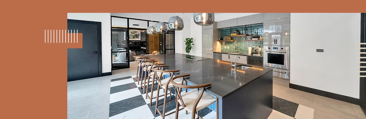 A photo of a community kitchen in an apartment community, with an orange border.