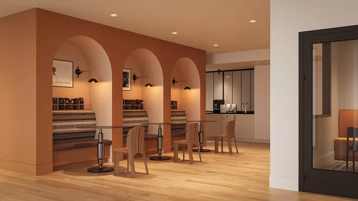 Café-style seating with orange arches and patterned benches