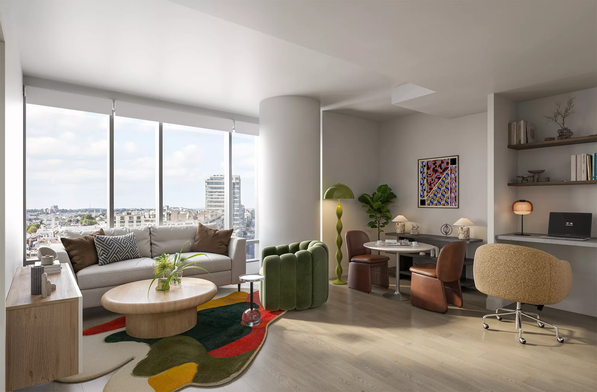 Apartment living area with sofa, desk, and floor-to-ceiling windows