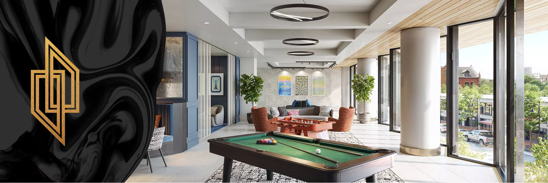 Modern lounge with pool table, seating area, large windows, and city views