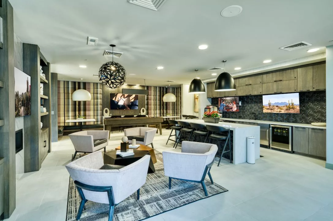 Chairs and bar seating in lounge area at Haverly