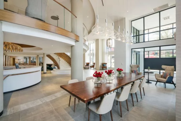 Resident area with table and chairs in main lobby